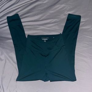 Lightly worn aerie cross over leggings , blue/green